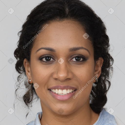 Joyful black young-adult female with medium  brown hair and brown eyes