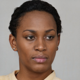 Neutral black young-adult female with short  brown hair and brown eyes