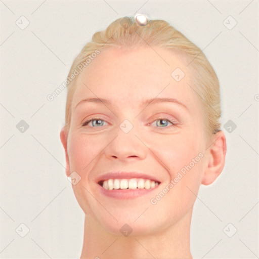 Joyful white young-adult female with short  brown hair and blue eyes