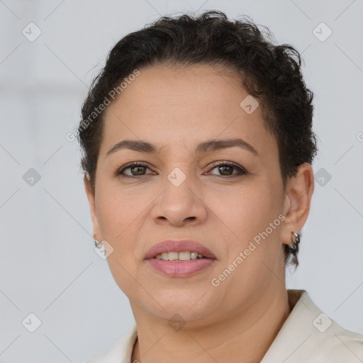 Joyful latino young-adult female with short  brown hair and brown eyes