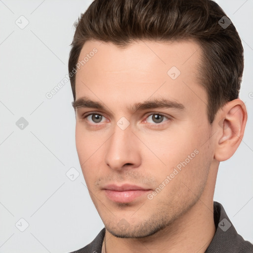 Neutral white young-adult male with short  brown hair and brown eyes