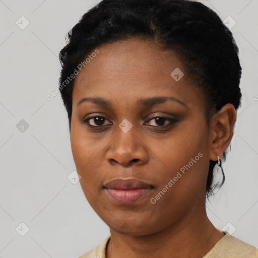 Neutral black young-adult female with short  black hair and brown eyes