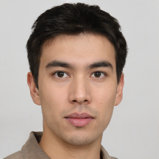 Neutral asian young-adult male with short  brown hair and brown eyes