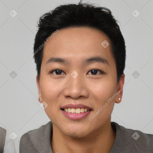 Joyful asian young-adult female with short  black hair and brown eyes