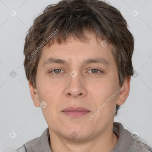 Neutral white young-adult male with short  brown hair and brown eyes