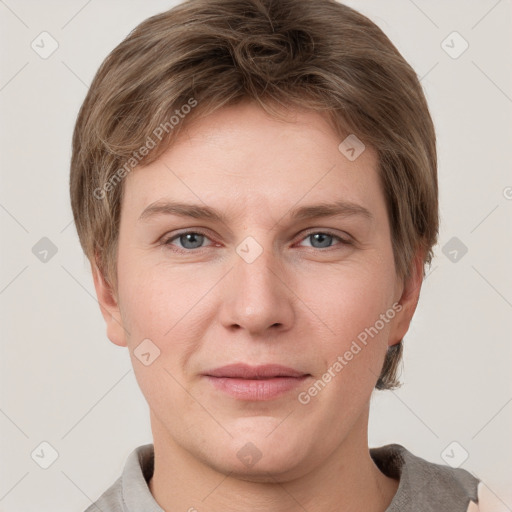 Joyful white young-adult female with short  brown hair and grey eyes