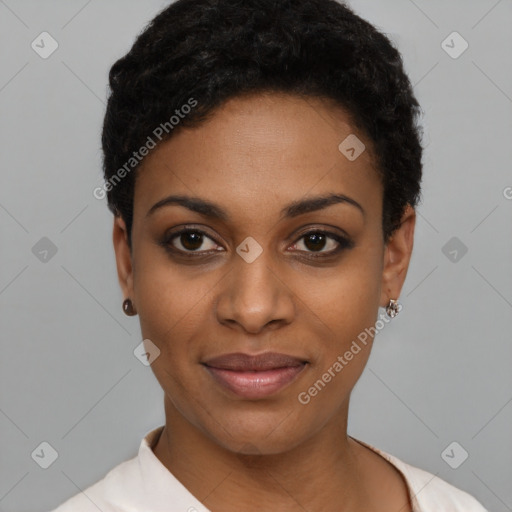 Joyful black young-adult female with short  black hair and brown eyes