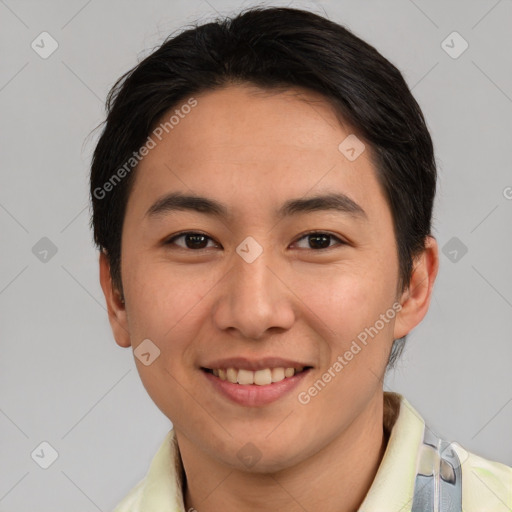 Joyful asian young-adult male with short  brown hair and brown eyes