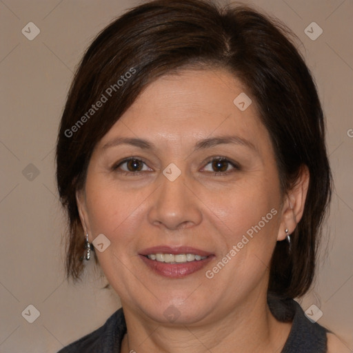 Joyful white adult female with medium  brown hair and brown eyes