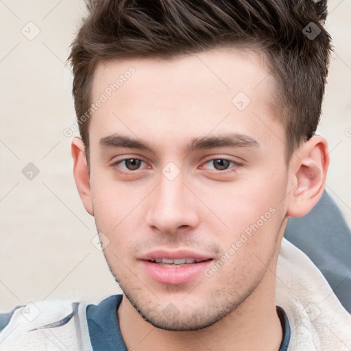 Neutral white young-adult male with short  brown hair and brown eyes