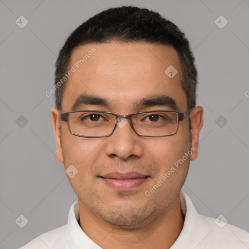 Joyful white young-adult male with short  black hair and brown eyes