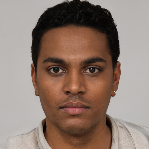 Neutral black young-adult male with short  black hair and brown eyes