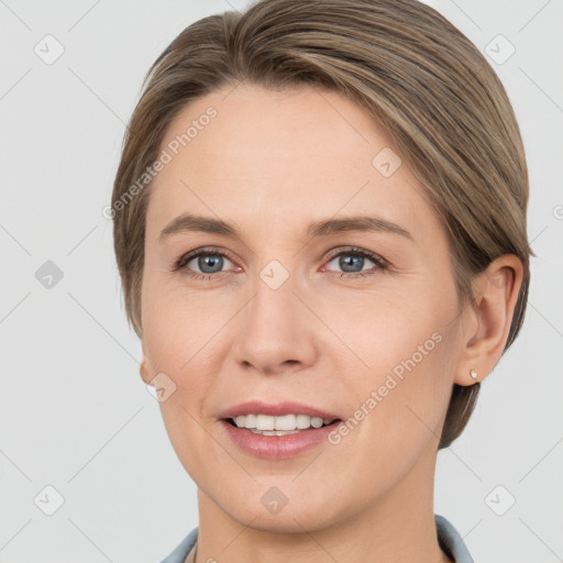 Joyful white young-adult female with medium  brown hair and grey eyes