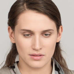 Neutral white young-adult female with medium  brown hair and brown eyes