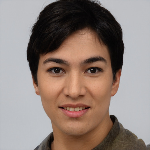 Joyful asian young-adult female with short  black hair and brown eyes