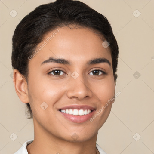 Joyful latino young-adult male with short  brown hair and brown eyes