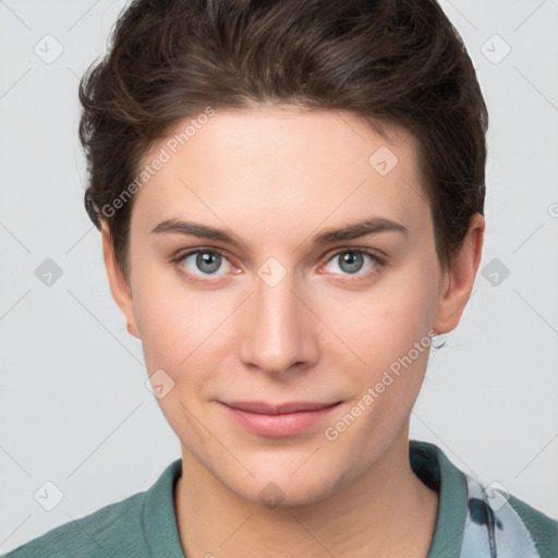 Joyful white young-adult female with short  brown hair and grey eyes