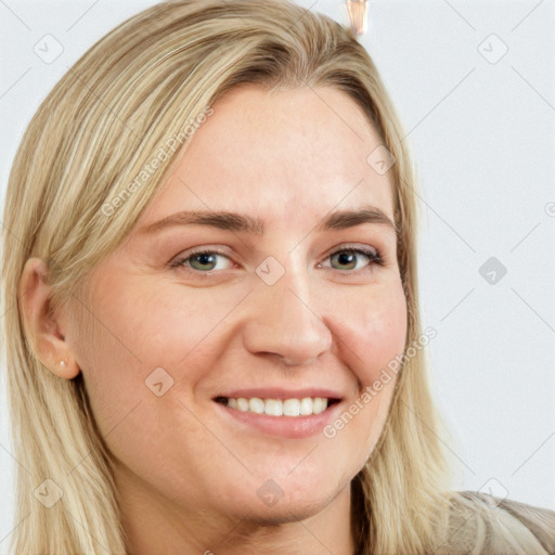 Joyful white young-adult female with long  brown hair and blue eyes