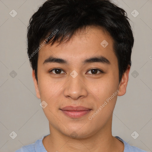 Joyful asian young-adult male with short  black hair and brown eyes