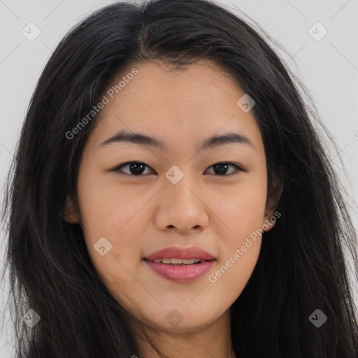 Joyful asian young-adult female with long  brown hair and brown eyes