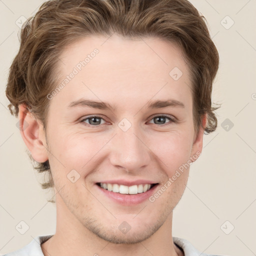 Joyful white young-adult female with short  brown hair and grey eyes