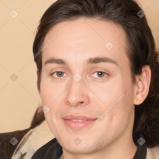 Joyful white young-adult male with medium  brown hair and brown eyes