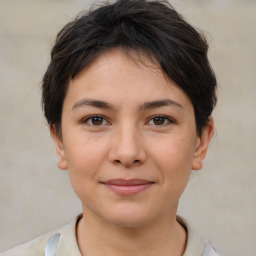 Joyful white young-adult female with medium  brown hair and brown eyes