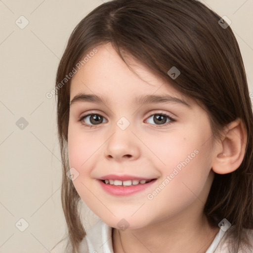 Joyful white child female with medium  brown hair and brown eyes