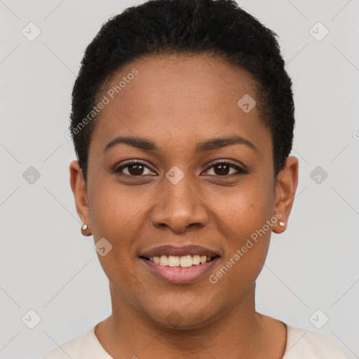 Joyful black young-adult female with short  brown hair and brown eyes