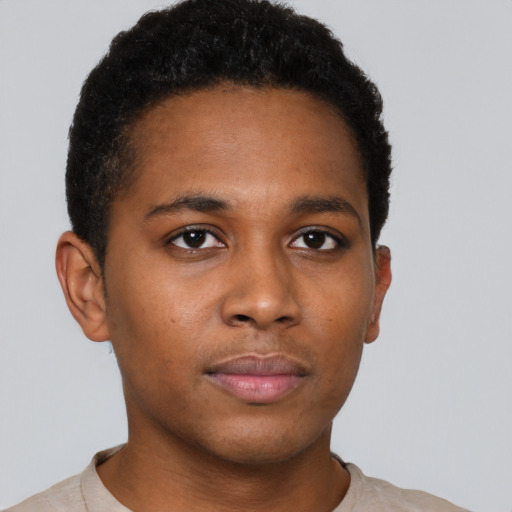 Neutral black young-adult male with short  brown hair and brown eyes