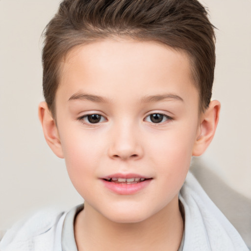 Joyful white child female with short  brown hair and brown eyes