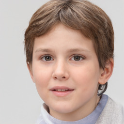 Joyful white child female with short  brown hair and brown eyes