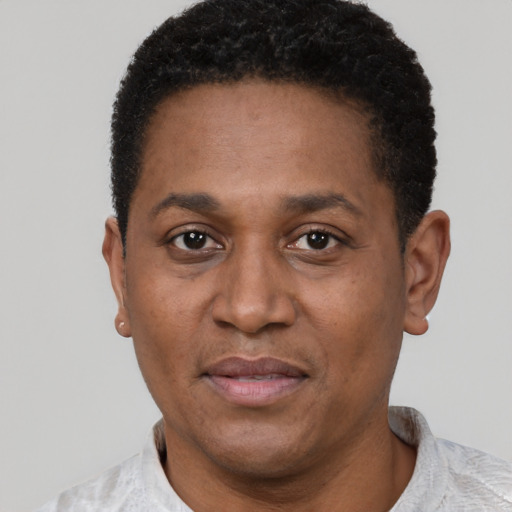 Neutral latino adult male with short  black hair and brown eyes