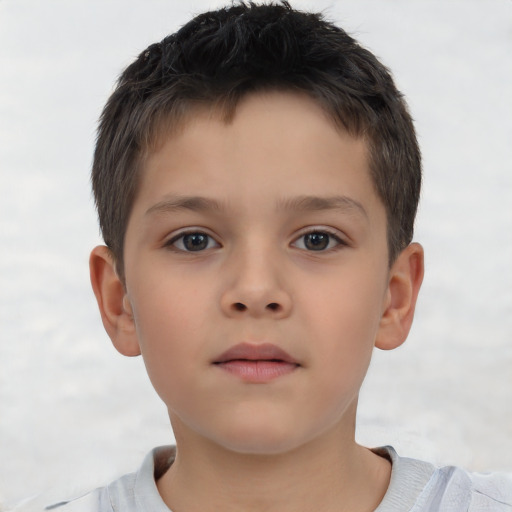 Neutral asian child male with short  brown hair and brown eyes