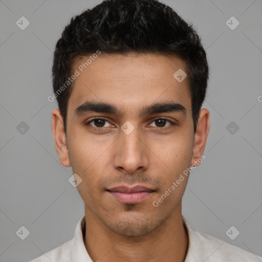 Neutral white young-adult male with short  black hair and brown eyes