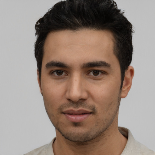 Neutral white young-adult male with short  black hair and brown eyes