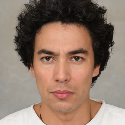 Neutral white young-adult male with short  black hair and brown eyes