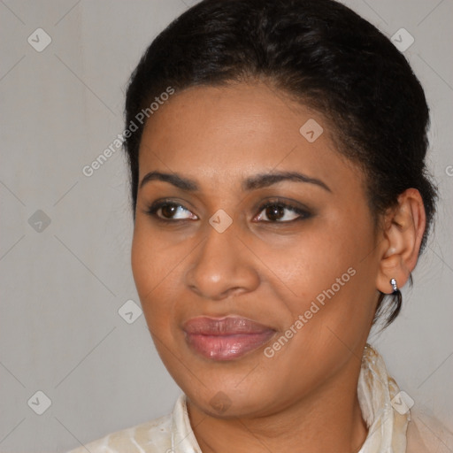 Joyful latino young-adult female with medium  brown hair and brown eyes