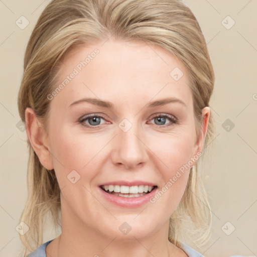 Joyful white young-adult female with medium  brown hair and blue eyes