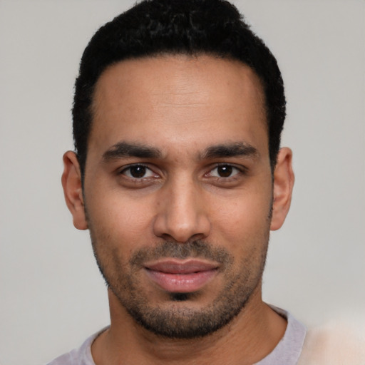 Neutral latino young-adult male with short  black hair and brown eyes