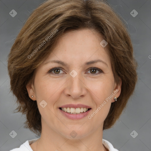 Joyful white adult female with medium  brown hair and brown eyes