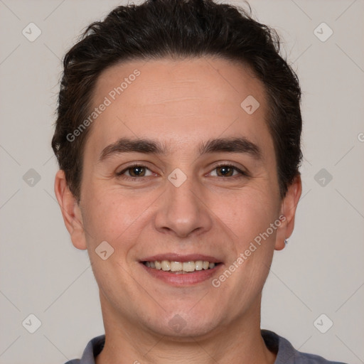 Joyful white young-adult male with short  brown hair and brown eyes