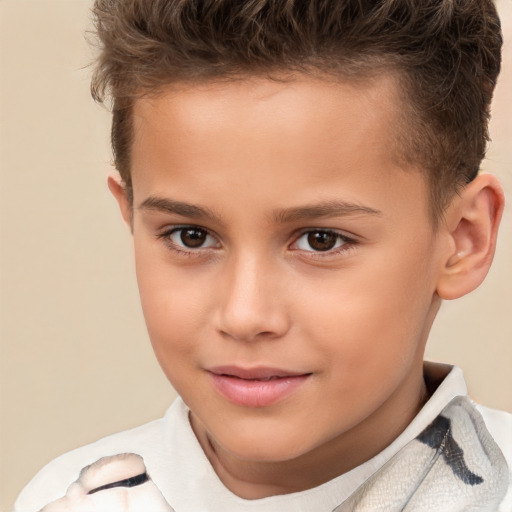 Joyful white child male with short  brown hair and brown eyes