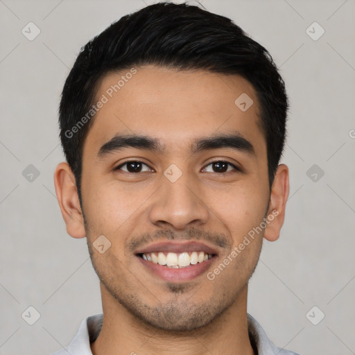 Joyful latino young-adult male with short  black hair and brown eyes