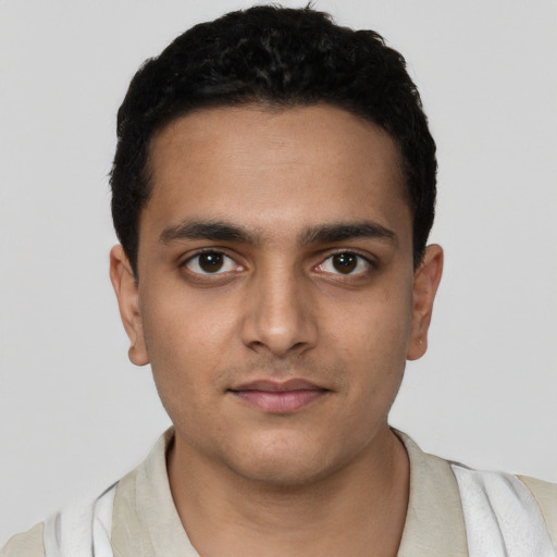 Neutral latino young-adult male with short  brown hair and brown eyes