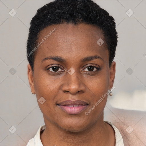 Joyful black young-adult female with short  black hair and brown eyes