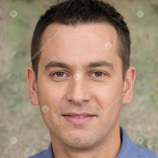 Joyful white adult male with short  brown hair and brown eyes