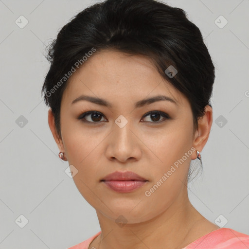 Joyful asian young-adult female with short  brown hair and brown eyes