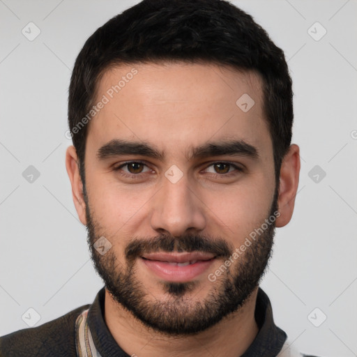 Joyful white young-adult male with short  black hair and brown eyes