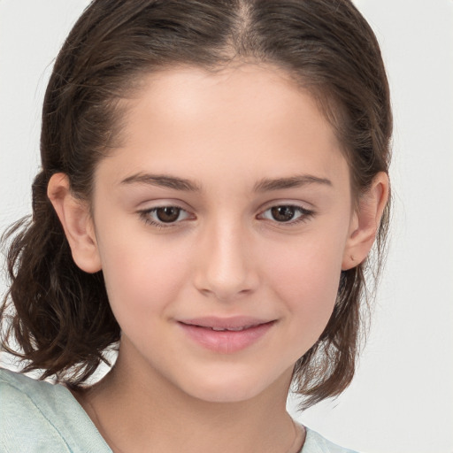 Joyful white child female with medium  brown hair and brown eyes